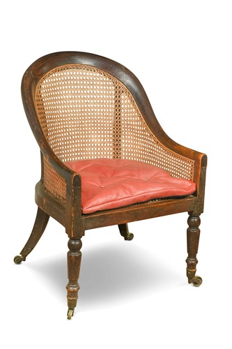 Lot 568 - A Regency simulated rosewood bergère armchair