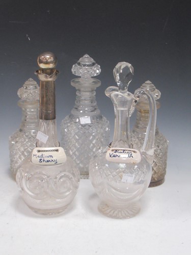 Lot 165 - A silver mounted decanter with swirl cut body,...