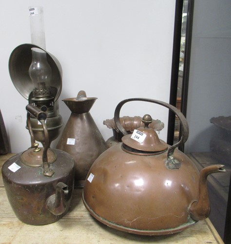 Lot 244 - A copper kettle, another, a half-gallon copper...