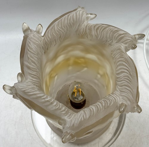 Lot 213 - In the manner of Lalique, a lucite table lamp