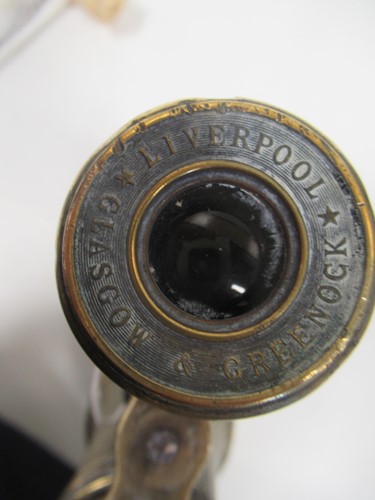 Lot 141 - A pair of Victorian brass binoculars; together...