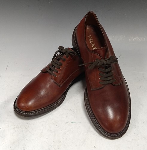 Lot 257 - Prada - pair dark brown leather lace up 'Derby'...