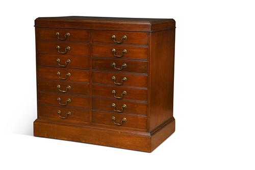 Lot 555 - A mahogany chest of fourteen drawers, early 20th century