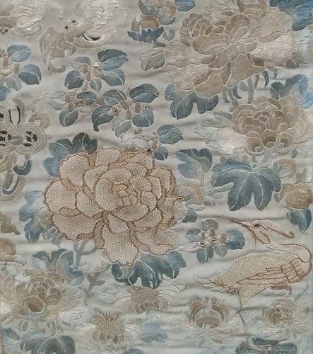 Lot 259 - Three framed textiles to include: an early...