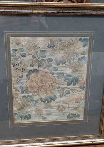 Lot 259 - Three framed textiles to include: an early...