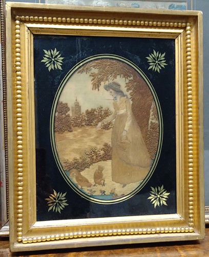Lot 259 - Three framed textiles to include: an early...