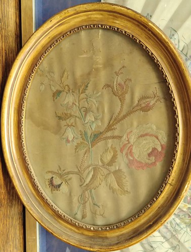 Lot 259 - Three framed textiles to include: an early...