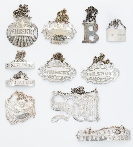 Lot 309 - A collection of eleven 19th century and later bottle labels