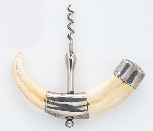 Lot 308 - An early 20th century silver and tusk corkscrew, retailed by Asprey