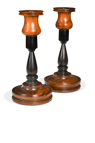 Lot 729 - A pair of Anglo Indian specimen wood turned candlesticks, 19th century