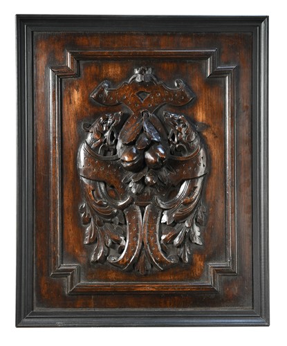 Lot 401 - A pair of carved oak panels depicting fruit, 19th century