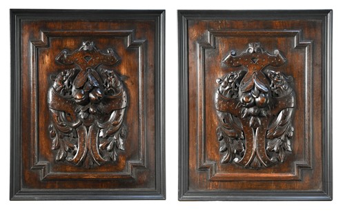 Lot 401 - A pair of carved oak panels depicting fruit, 19th century