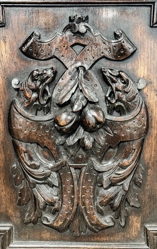 Lot 401 - A pair of carved oak panels depicting fruit, 19th century