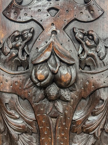 Lot 401 - A pair of carved oak panels depicting fruit, 19th century