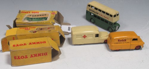 Lot 306 - Three Dinky Toys, a 253 Daimler Ambulance...