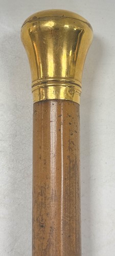 Lot 728 - An Edward VII 12ct gold topped walking cane by Brigg