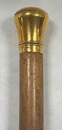 Lot 728 - An Edward VII 12ct gold topped walking cane by Brigg