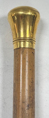 Lot 728 - An Edward VII 12ct gold topped walking cane by Brigg