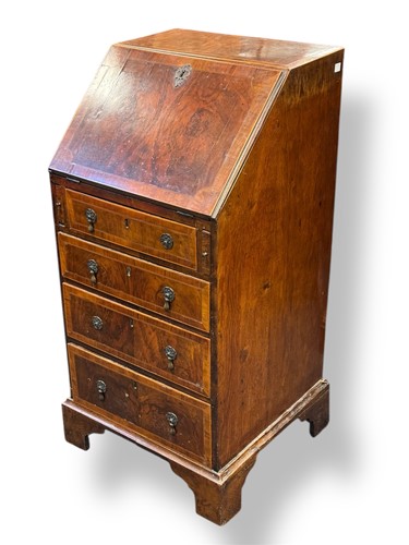 Lot 604 - A yew and crossbanded desk or bureau of small...