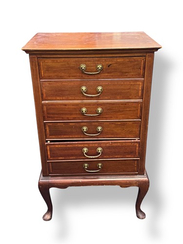 Lot 606 - An Edwardian music cabinet fitted with six...