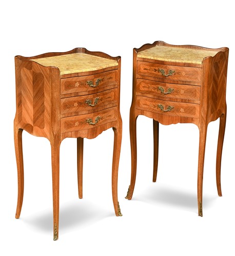 Lot 586 - A pair of Louis XV style kingwood and marble topped bedside cabinets
