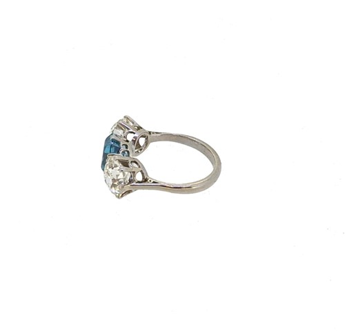 Lot 202 - A zircon and diamond three stone ring