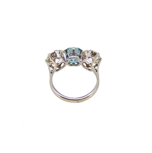 Lot 202 - A zircon and diamond three stone ring