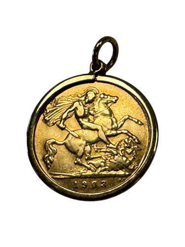 Lot 309 - A 1908 half sovereign within a hallmarked 9ct...