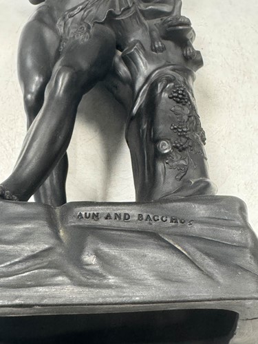 Lot 713 - A Wedgwood black basalt figure of the Faun and Bacchus, 19th century