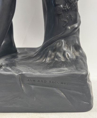 Lot 713 - A Wedgwood black basalt figure of the Faun and Bacchus, 19th century