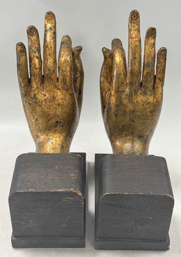 Lot 97 - A pair of Tibetan gilt bronze Buddha hands, 19th century