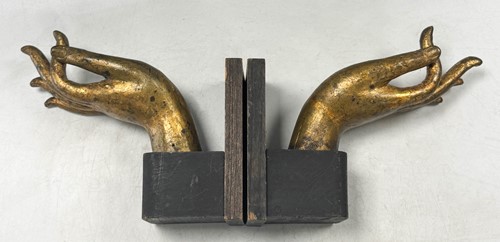 Lot 97 - A pair of Tibetan gilt bronze Buddha hands, 19th century