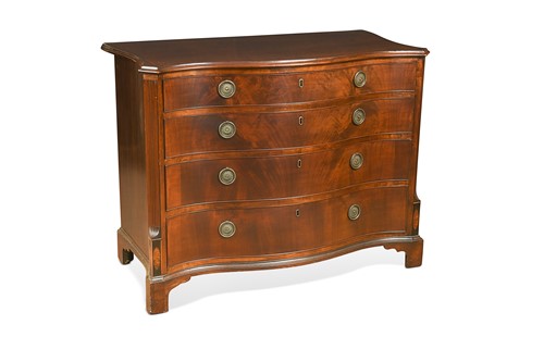Lot 698 - A George III mahogany serpentine chest
