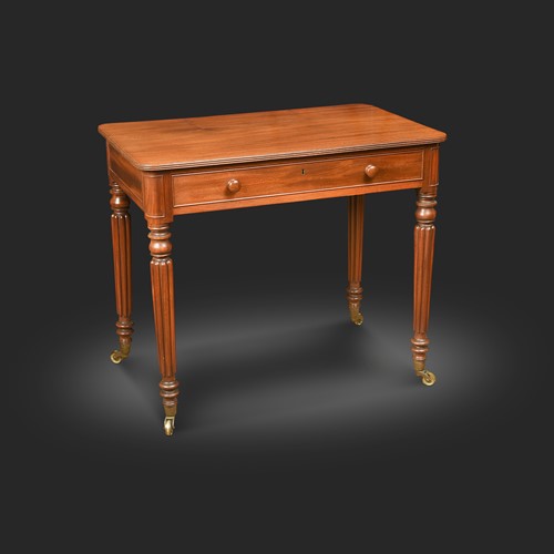 Lot 600 - A mahogany chamber writing table, in the manner of Gillows, 19th century