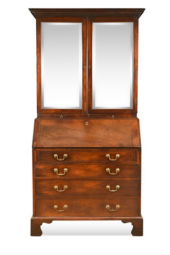 Lot 551 - A George III mahogany bureau bookcase