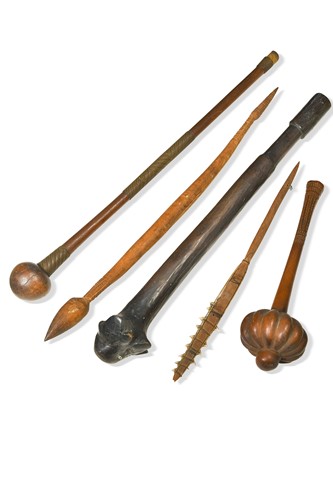 Lot 676 - A group of tribal clubs and a knife, 19th century or earlier