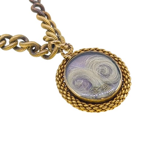 Lot 91 - A Victorian padlock bracelet and locket