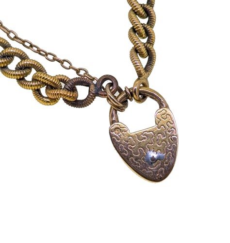 Lot 91 - A Victorian padlock bracelet and locket