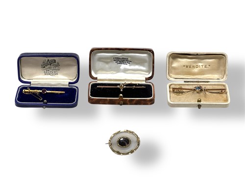 Lot 284 - Four brooches, including a paste spider bar...