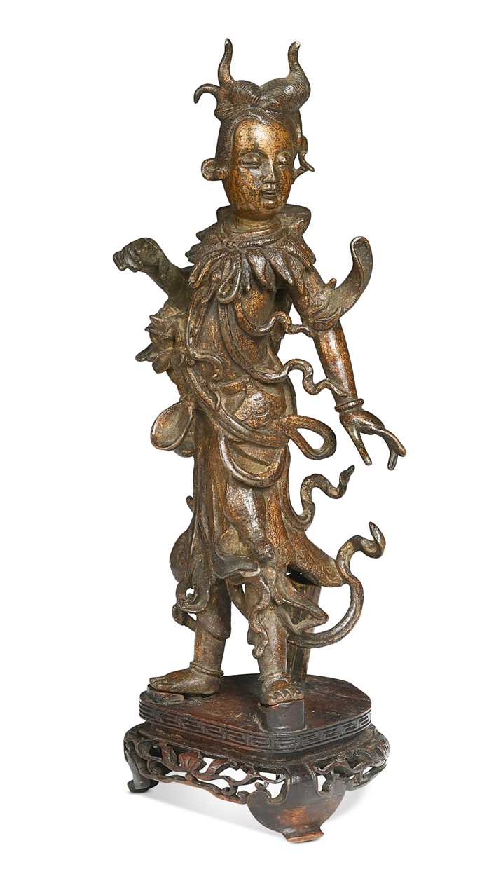 Lot 56 - A Chinese gilt bronze female deity, late Ming Dynasty (1368-1644)