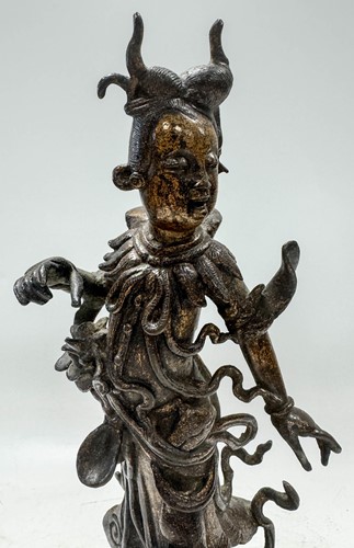 Lot 56 - A Chinese gilt bronze female deity, late Ming Dynasty (1368-1644)