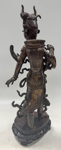 Lot 56 - A Chinese gilt bronze female deity, late Ming Dynasty (1368-1644)