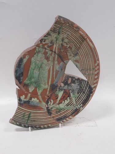 Lot 91 - A fragmentary pottery slip decorated dish,...