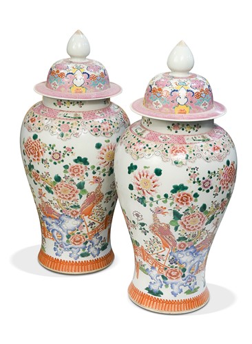 Lot 42 - A pair of Chinese famille rose vases and covers in 18th century style
