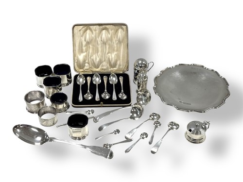 Lot 250 - A collection of silverware including cruets,...