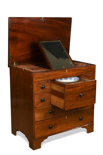 Lot 702 - A George III mahogany dressing chest of drawers