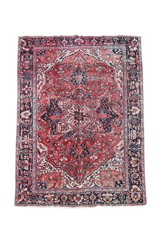 Lot 719 - A Heriz carpet
