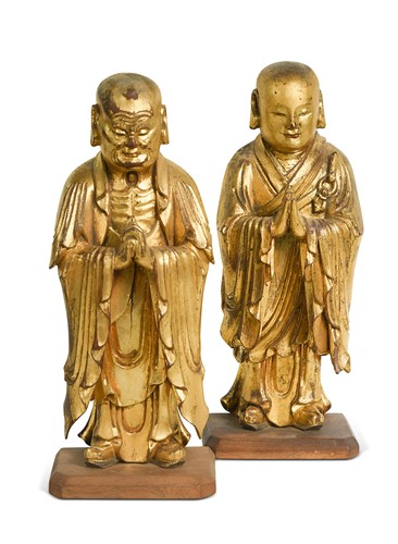 Lot 68 - A pair of Chinese carved, lacquered and gilded wood Buddhistic disciples, Qing Dynasty, 19th century