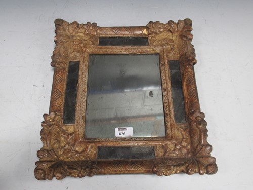 Lot 676 - A 17th century Continental carved wood and...