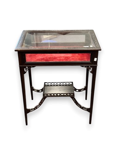 Lot 630 - An Edwardian display cabinet with blind-fret...